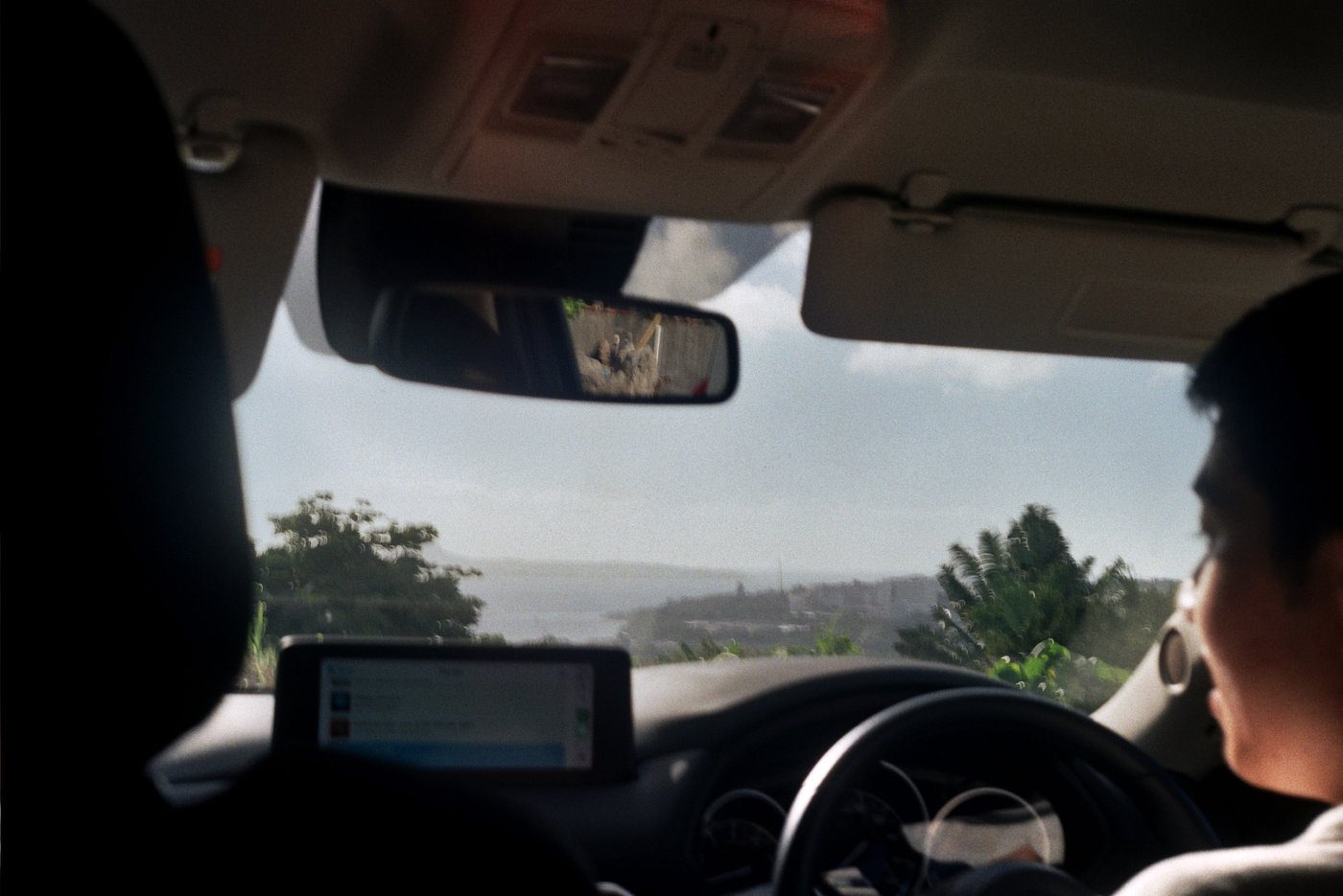 Looking out at the coast from inside a car