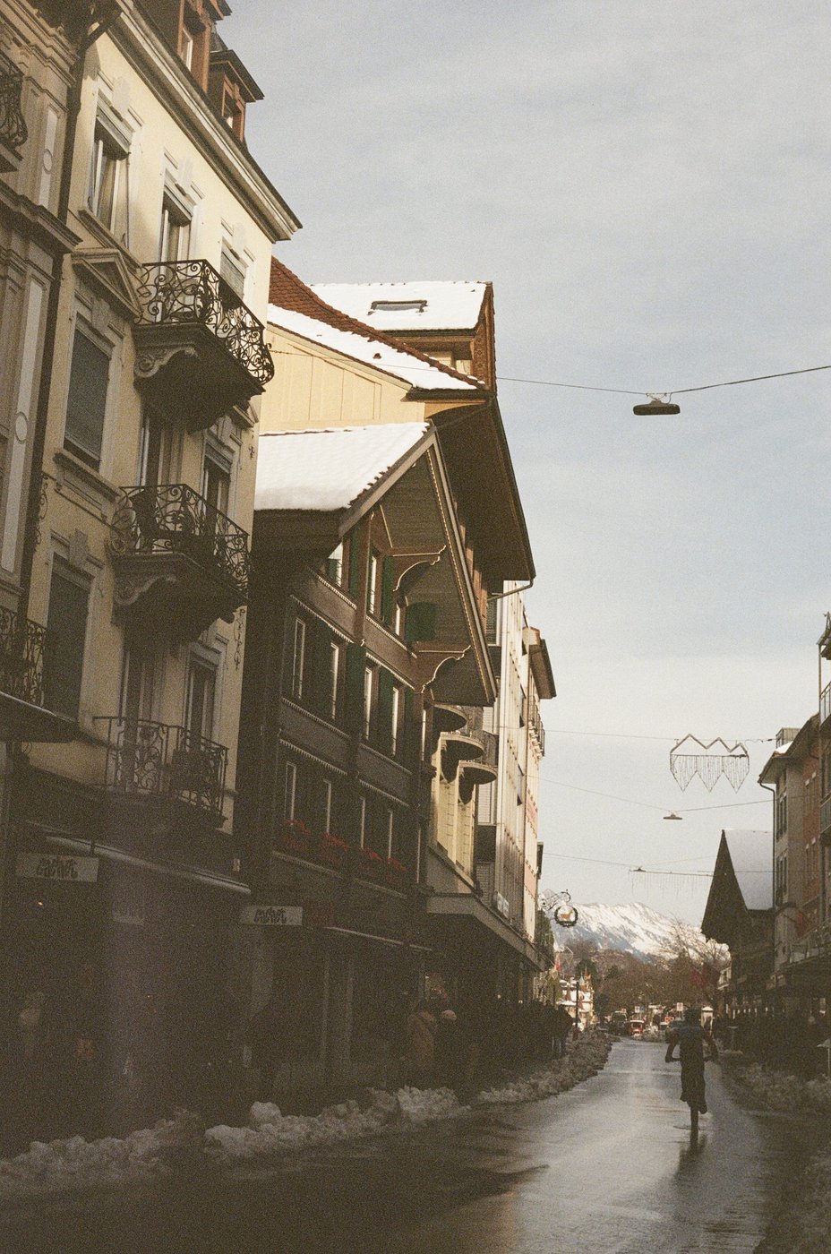 Snowy street lined with buildings in Zurich