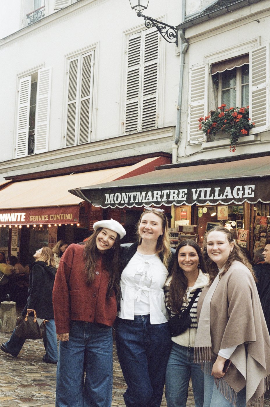Friends posing outside Montmartre Village