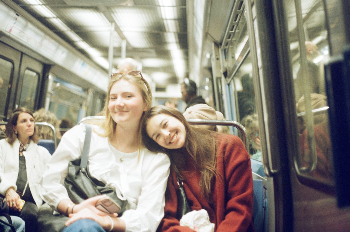 Friends riding the Paris metro